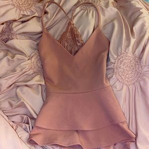 Never worn, Pink classy blouse. Lace in the back, Opened back.